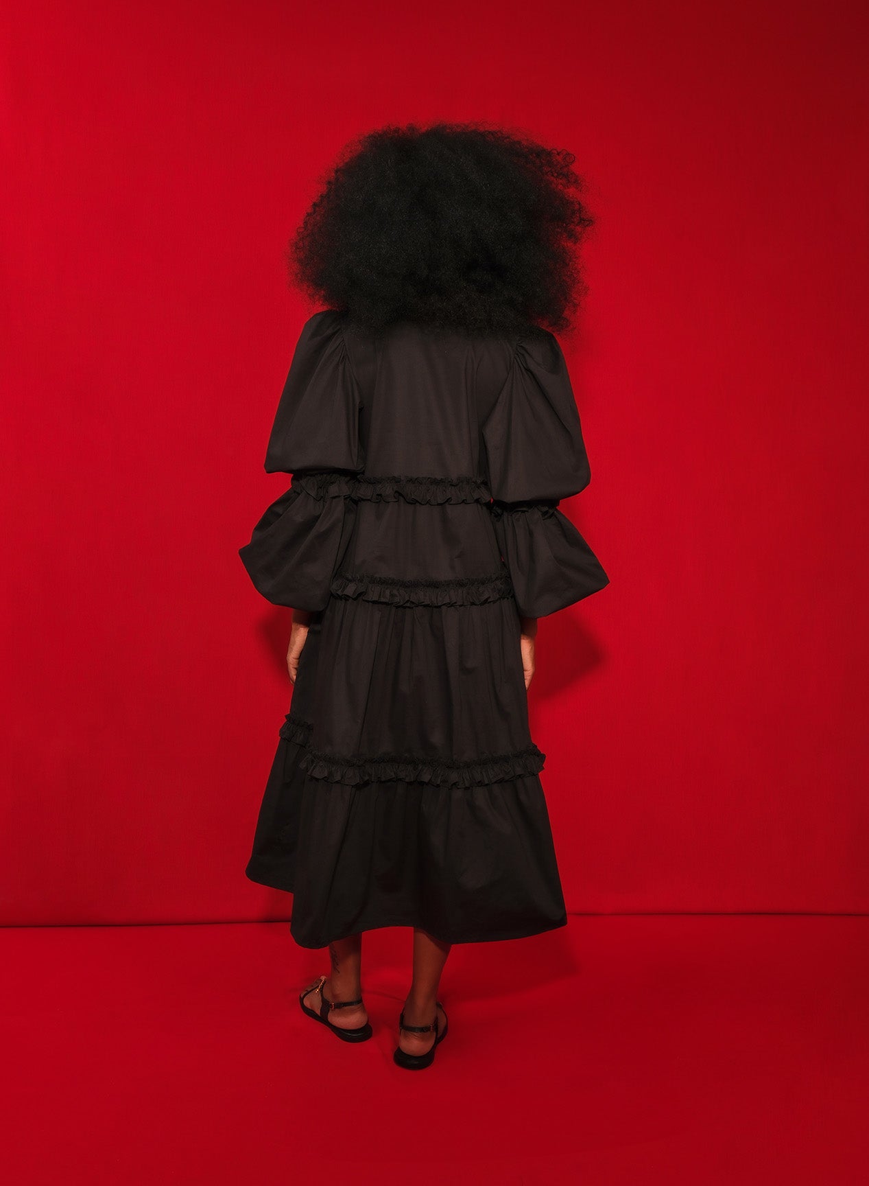 Model wearing long sleve poplin midi dress