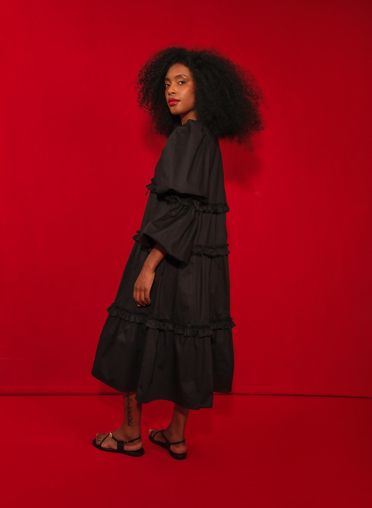 Model wearing long sleve poplin midi dress
