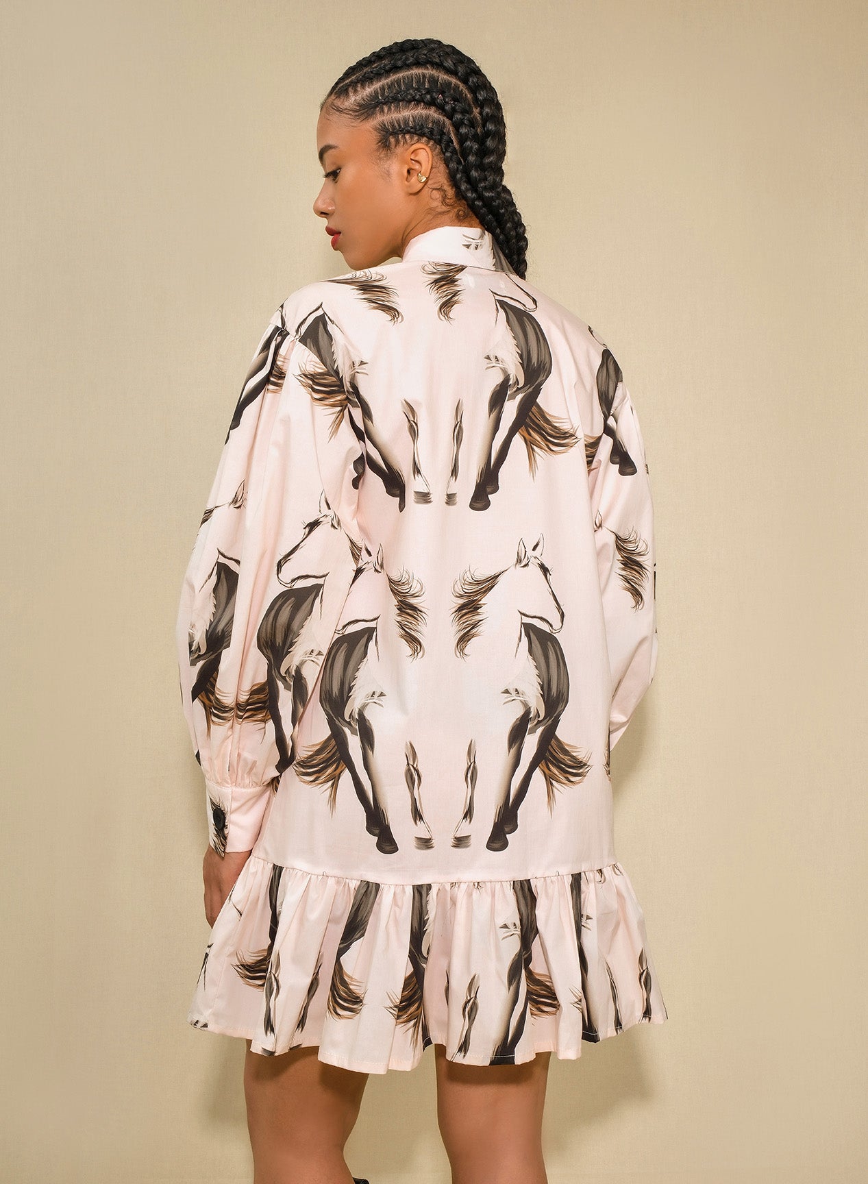 Back model wearing mini shirt dress puff sleeves