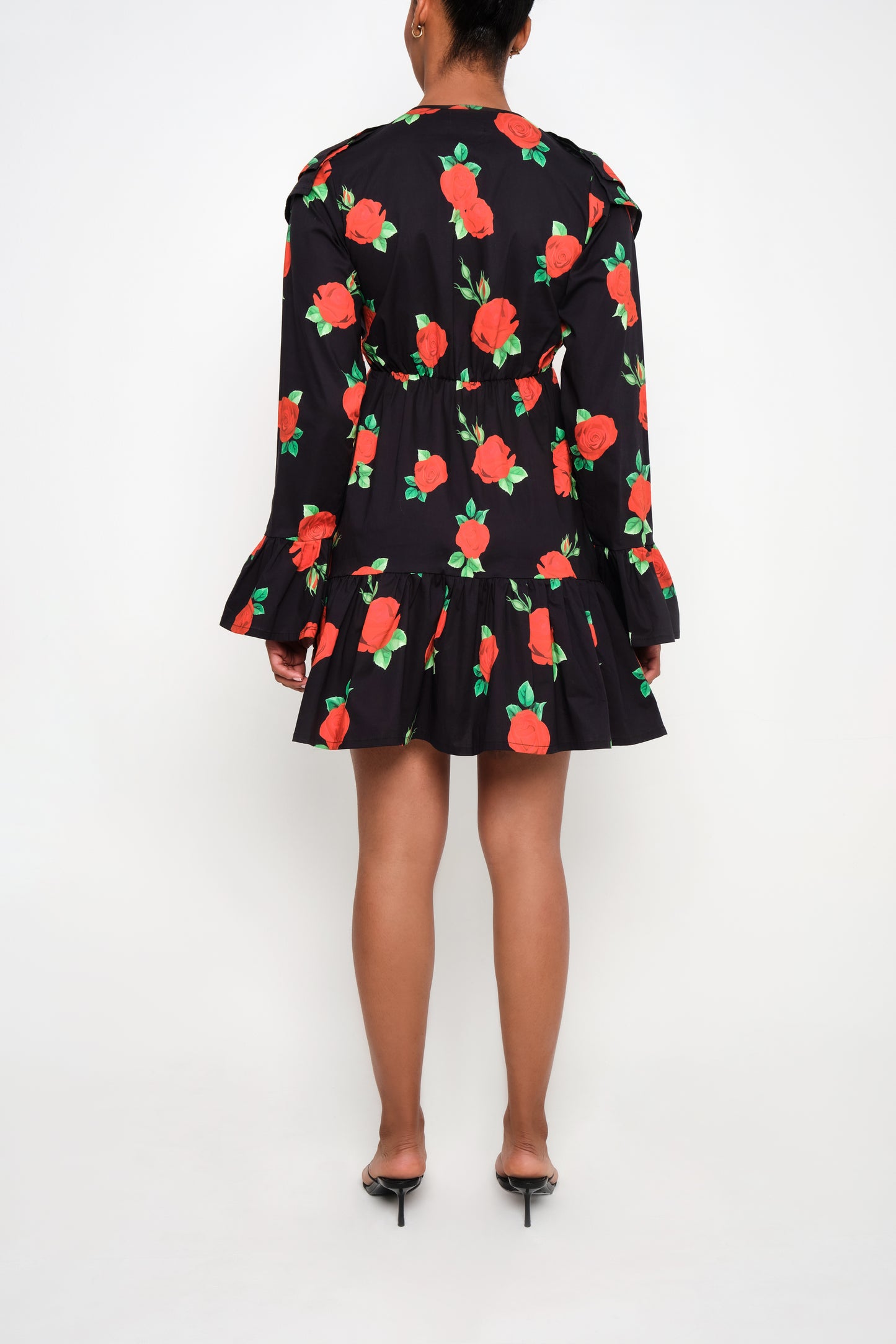 Model wearing tiered poplin mini dress with ruffle collar and Maxi Roses print