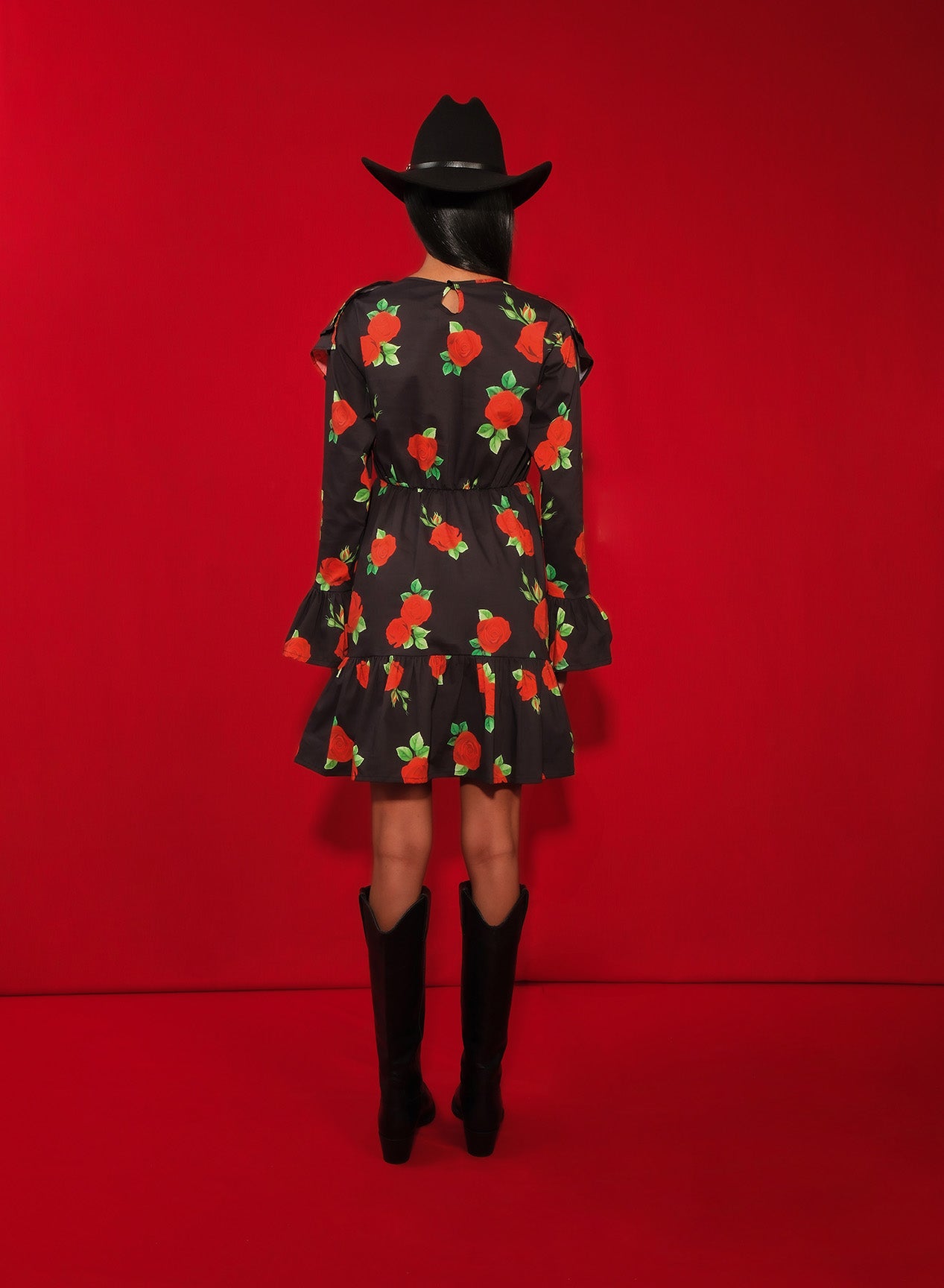 Model wearing tiered poplin mini dress with ruffle collar and Maxi Roses print