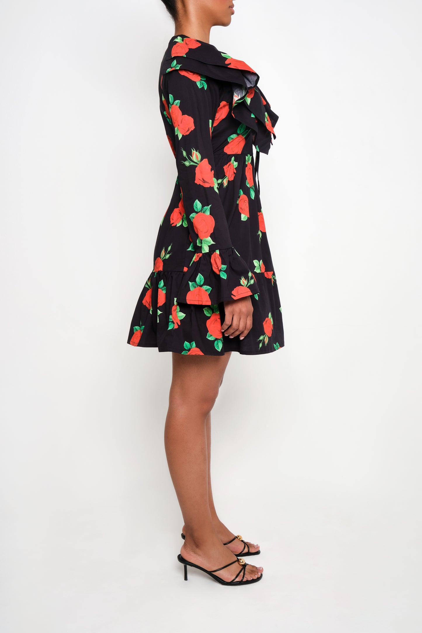 Model wearing tiered poplin mini dress with ruffle collar and Maxi Roses print