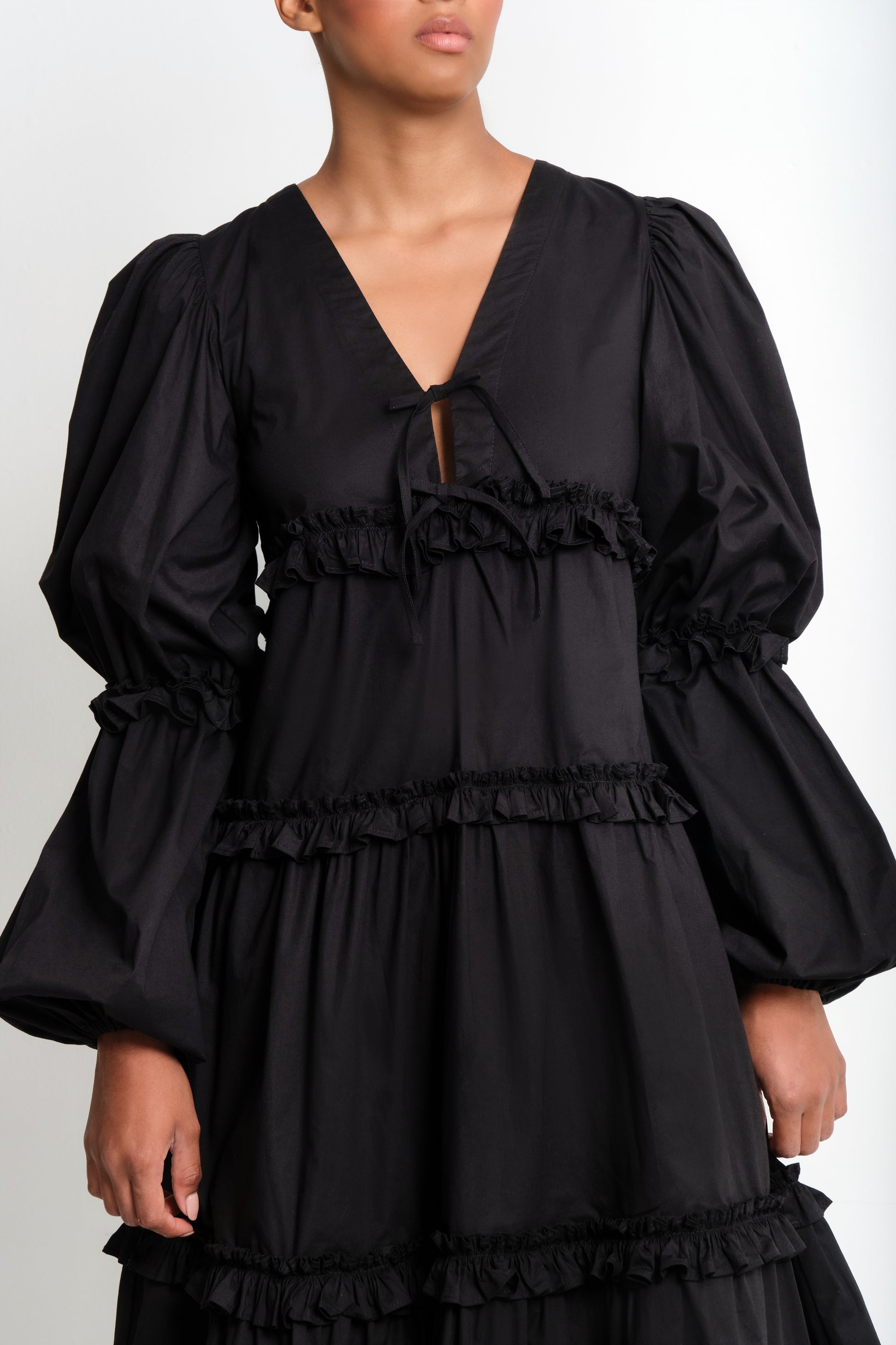 Model wearing long sleve poplin midi dress
