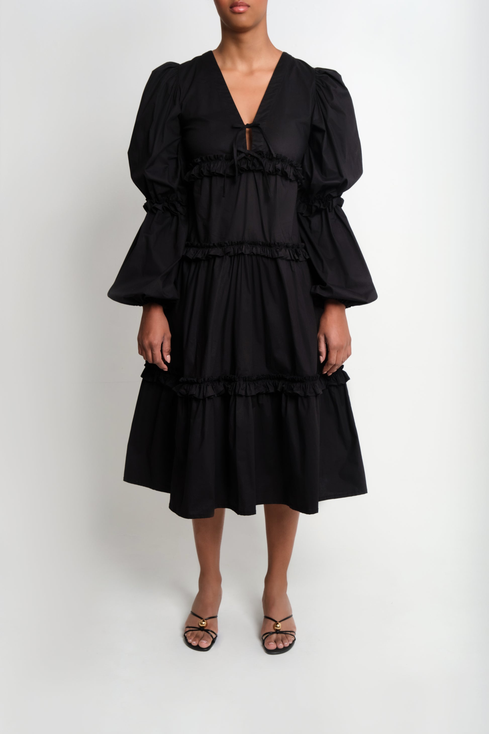 Model wearing long sleve poplin midi dress