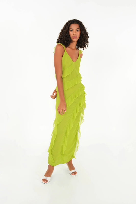 Woman wearing a green dress on a white background