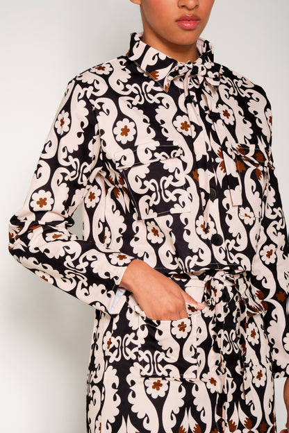 Model wearing cropped paisley jacket in heavy cotton with flap pockets