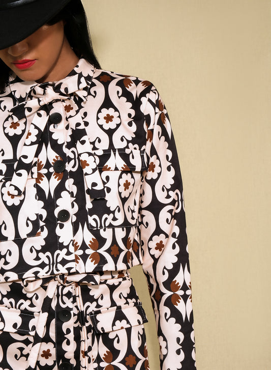 Model wearing cropped paisley jacket in heavy cotton with flap pockets
