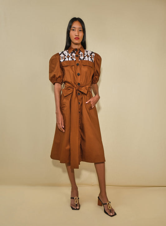 Model wearing a puff sleeve poplin midi shirt dress