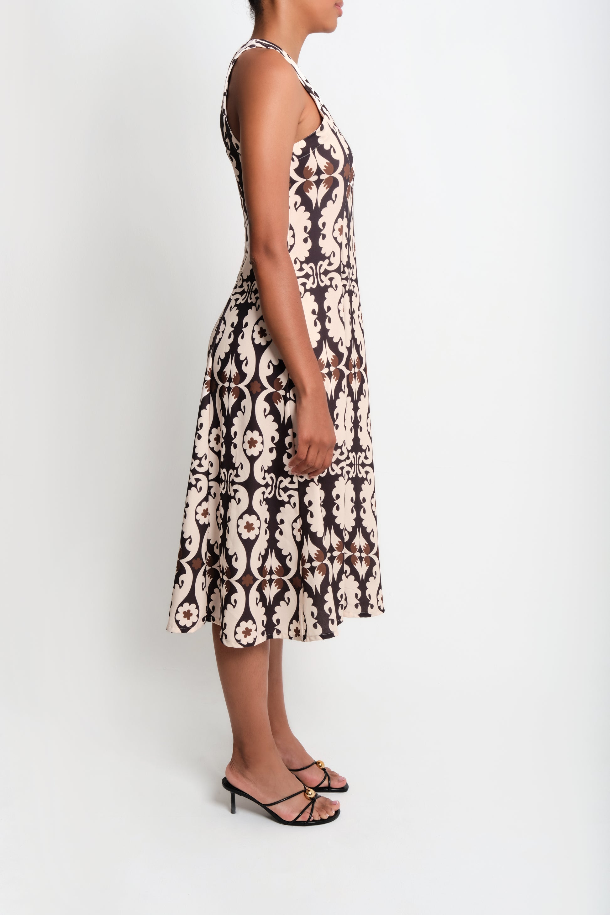 Model wearing a line midi dress side