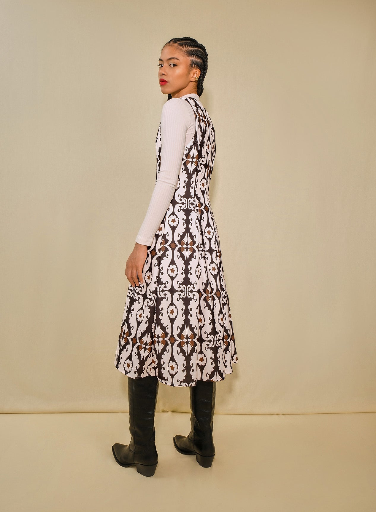 Sleeveless, a line midi dress on model 