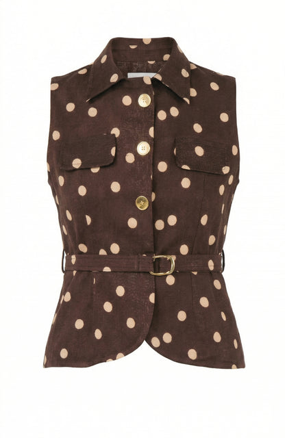 Brown sleeveless jacket with white polka dots on a white background